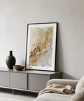 Minimalist decor scene with gray, gold, and beige ink poster