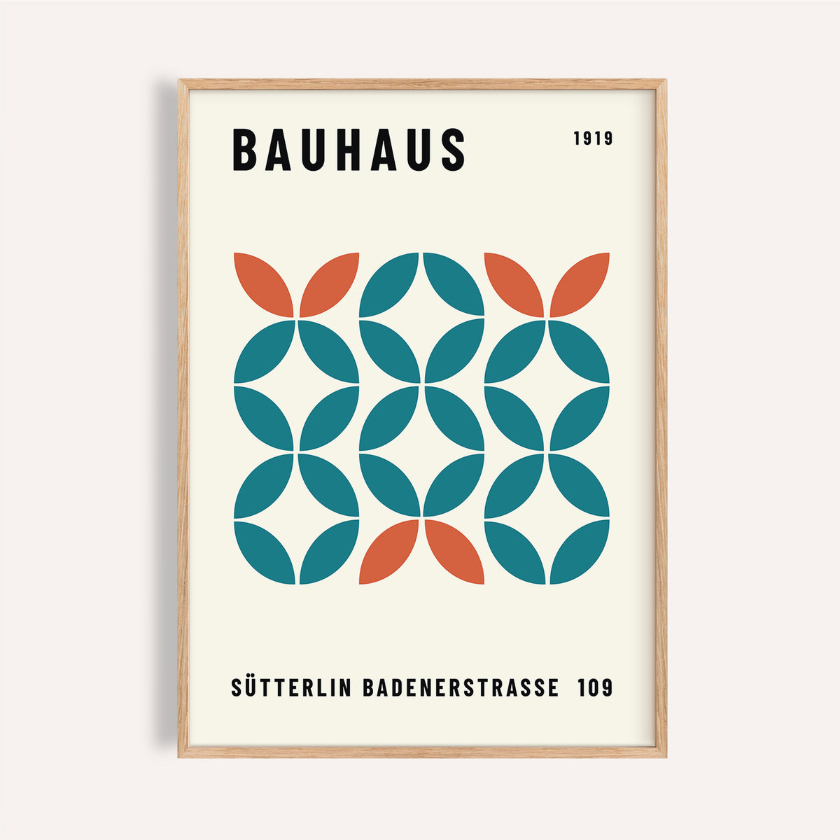 Teal and rust work office wall art with circular Bauhaus shapes