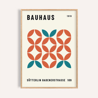 Framed print of Bauhaus modern geometric wall art with teal and rust shapes in a minimalist style
