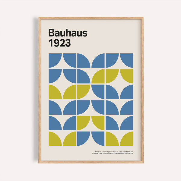 Modern office wall decor in blue and lime with Bauhaus shapes