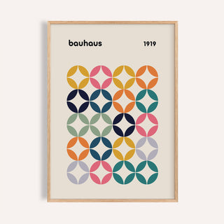 Framed close-up of a colorful grid pattern with Bauhaus style circles in muted tones