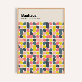 Framed print close-up of colorful Bauhaus geometric block pattern with yellow pink and dark grey