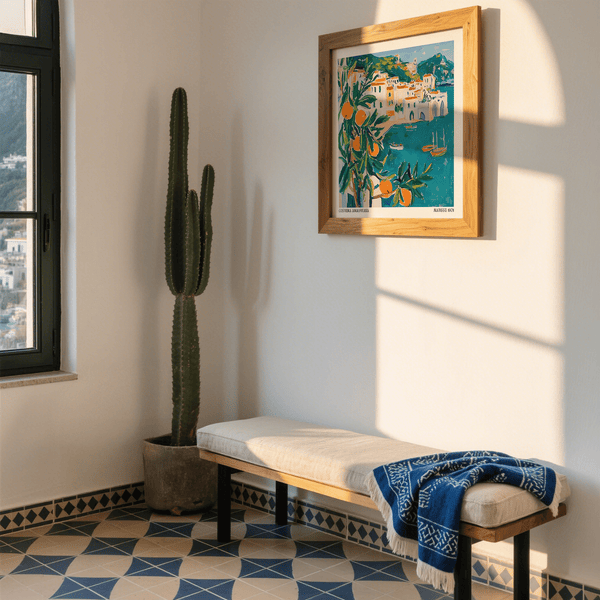 Amalfi Coast Print in small entry way with bench and tropical plant