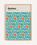 Teal and orange graphic wall art with repeating geometric pattern for office