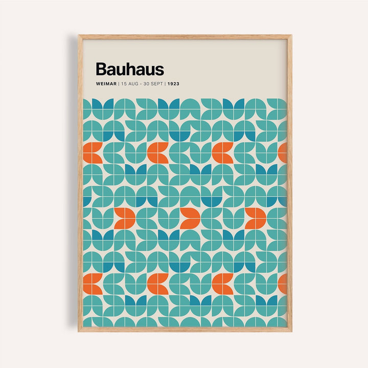 Teal and orange graphic wall art with repeating geometric pattern for office