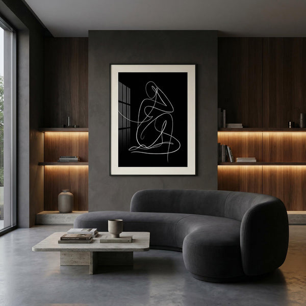 Modern living room with a gray sofa, coffee table, and abstract art on a dark wall.