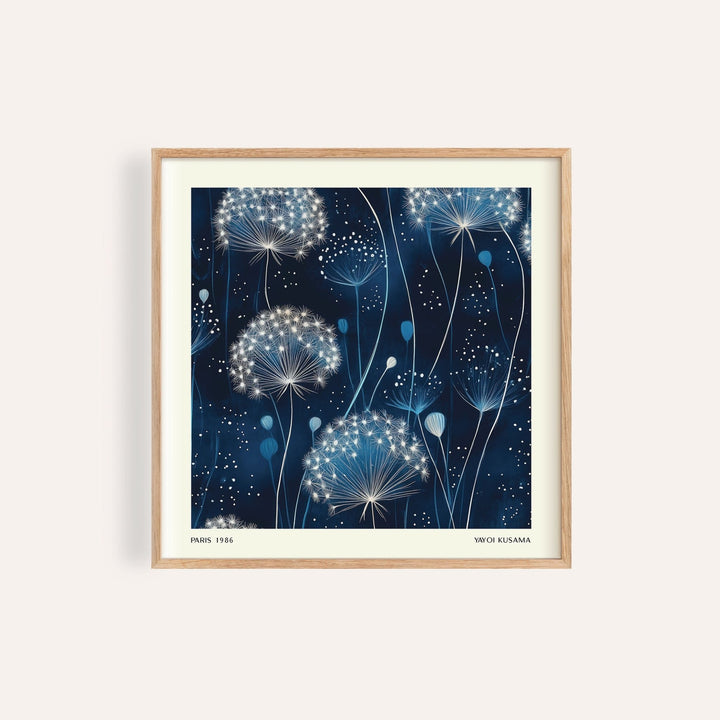 Midnight blue art work with glowing white dandelions