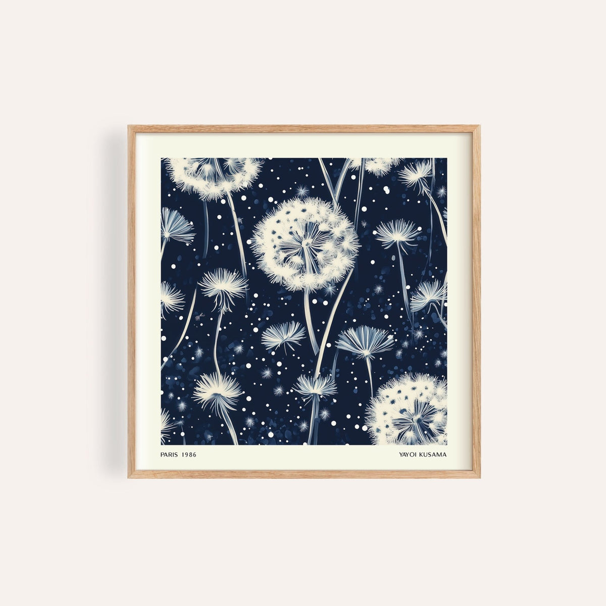 Navy and white wall art with floating abstract dandelions