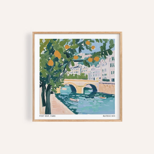 Colorful wall art of Paris showing boats along the Seine River.

