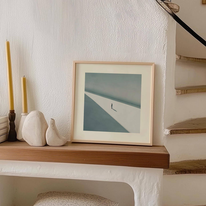 Art Prints Square framed print of a solitary person in shadow on a wooden mantelpiece with candles