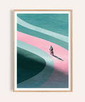 Minimalist Cycling Art Print featuring a lone cyclist on layered curves