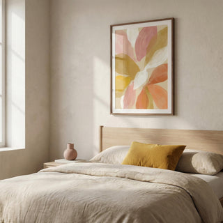 Neatly made bed with a wooden headboard and abstract floral artwork on the wall.