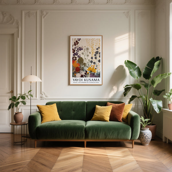 Yayoi Kusama large floral wall art above green sofa