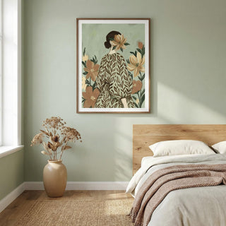 Bedroom with a wooden headboard, floral artwork on the wall, and a vase with flowers on the floor.