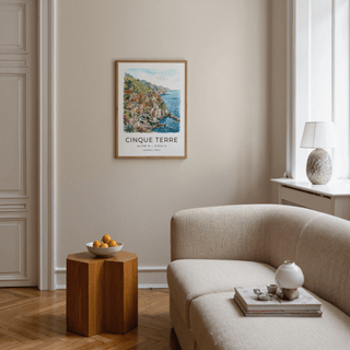 Coastal illustration of colorful Italian houses stacked on rugged cliffs