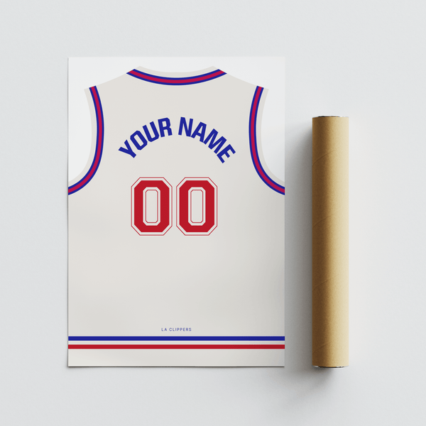 Minimal desk scene featuring LA Clippers Basketball Jersey Poster beside basketball memorabilia