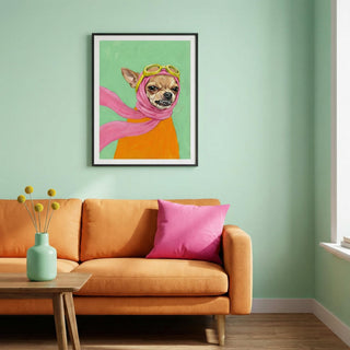 Living room with a framed artwork of a dog wearing a hijab on a green wall.