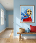 Room interior with a framed painting of a dog wearing a blue headscarf and red outfit, wooden bench with decorative items, and light blue walls.
