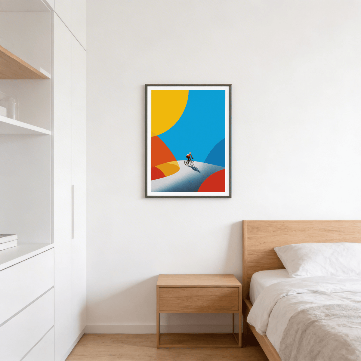 Graphic cycling wall art print showing a rider on a curved path with overlapping semicircle forms