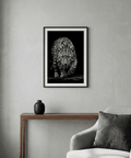 Dramatic leopard wall art print with sharp fur texture and a minimal background