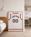 Displaying basketball jersey wall art poster with red trim, 00 number, and team name at bottom