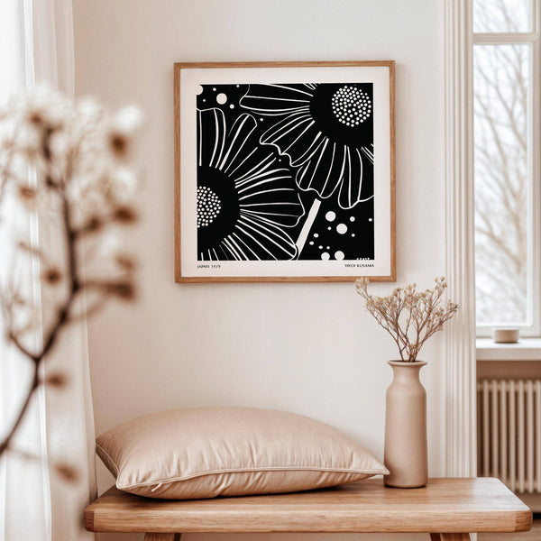 Square-format minimalist decor with striking black and white floral designs