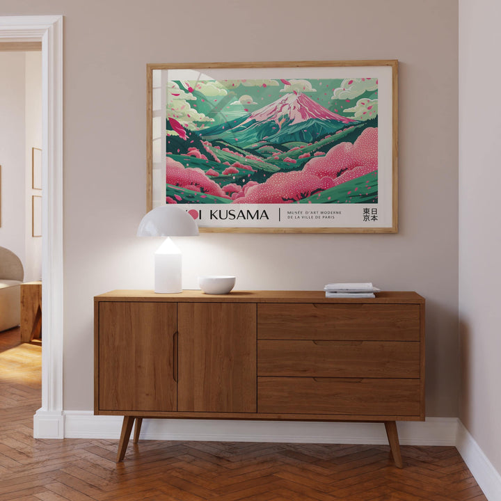 Cherry Blossom Art framed print close-up with pink and green tones above a wooden cabinet in a living room