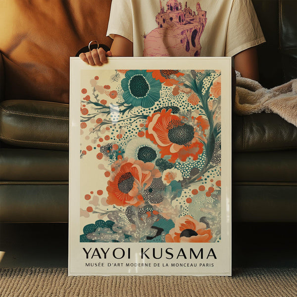 Teal and orange wall art on cream background with dot-rich details