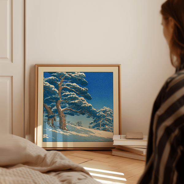 Gallery-style photo of Hasui Kawase snowy pines art print with subtle border