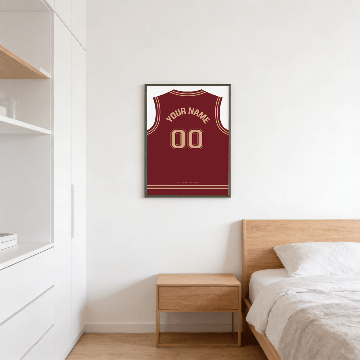Showing maroon and gold basketball jersey silhouette poster with arched name lettering and double zero numerals