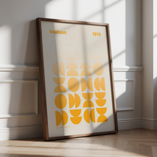 Posters Bauhaus featuring yellow geometric half circles on a cream background.