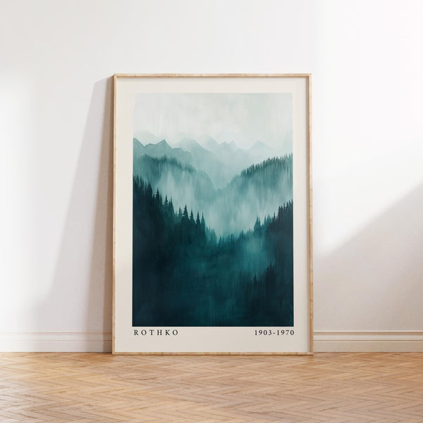 Mountain wall art with layered blue-green forest and misty peaks.