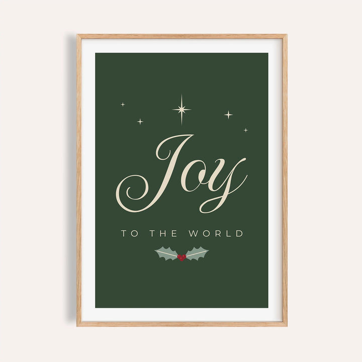 Joy to the World Christmas print in forest green and cream on a plain wall