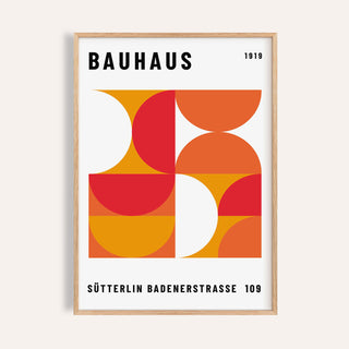 Framed print close-up of Mid Century Wall Art with orange and red geometric shapes and text
