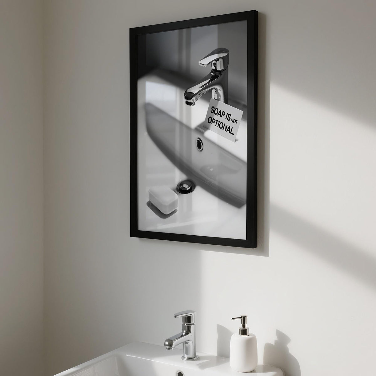Simple bar of soap next to a sleek wash hands sign in bathroom.
