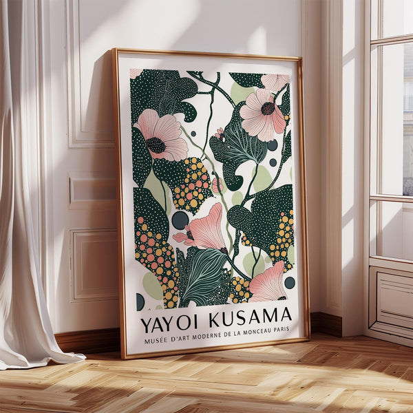 Wall art with pink flowers and dotted green foliage on a white background