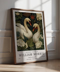 Swan Wall Art with two white swans surrounded by detailed green foliage and ivory flowers.