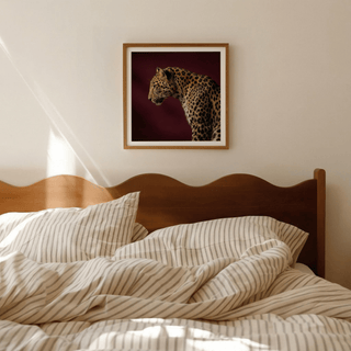 Close-up leopard poster featuring rosette spots and calm negative space