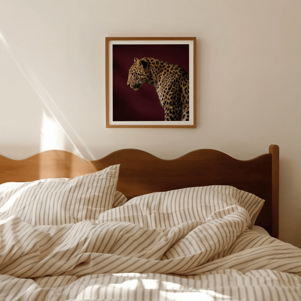 Close-up leopard poster featuring rosette spots and calm negative space