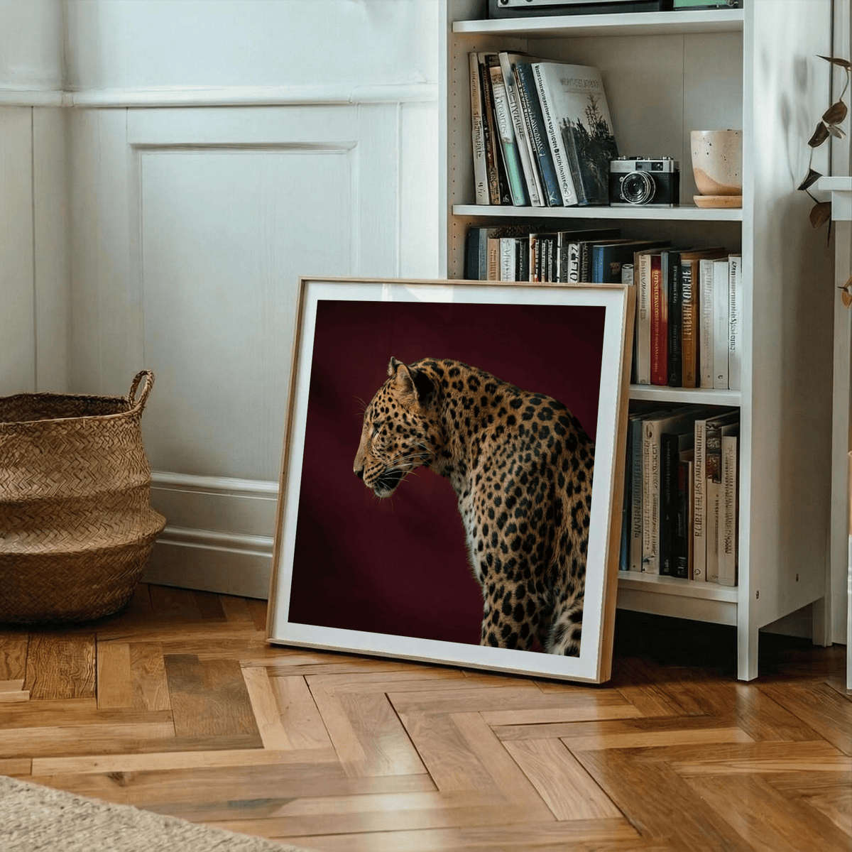 Side-view leopard wall art showing defined ear silhouette and sharp fur texture