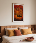 Indian Sunset Wall Art artwork framed on a wall with wide water foreground and boats