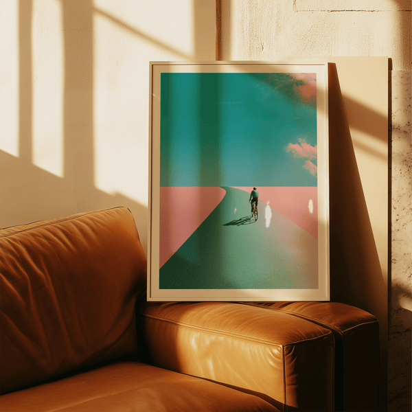 Living room display of Surreal Cycling Art Print wall art featuring cyclist on curving roadway