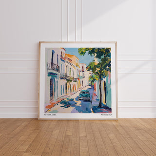 Vintage teal car and pastel balconies featured in Paintings of Cuba.