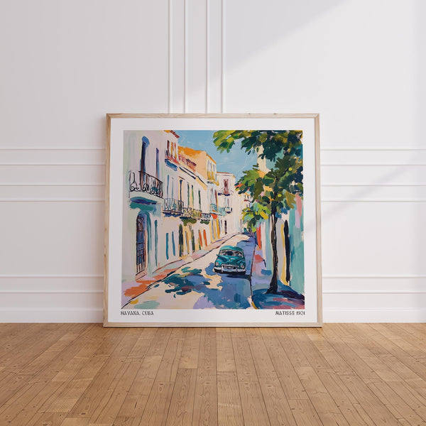 Vintage teal car and pastel balconies featured in Paintings of Cuba.