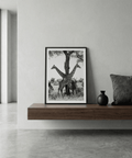 Vertical Giraffe Black and White Art Print with mirrored giraffe necks and strong central tree