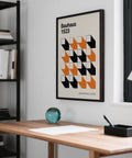 Graphic poster in black and orange, ideal artwork for office walls.