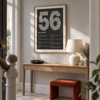 1956 Halftone Print, framed on the wall of a bright entrance hall in a thoughtfully renovated UK terrace with a pale grey wall and plain limestone floor