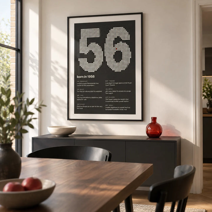 1956 Halftone Print, framed on the wall of a modern dining room in a UK semi-detached home with an off-white wall and a walnut dining table with simple black chairs