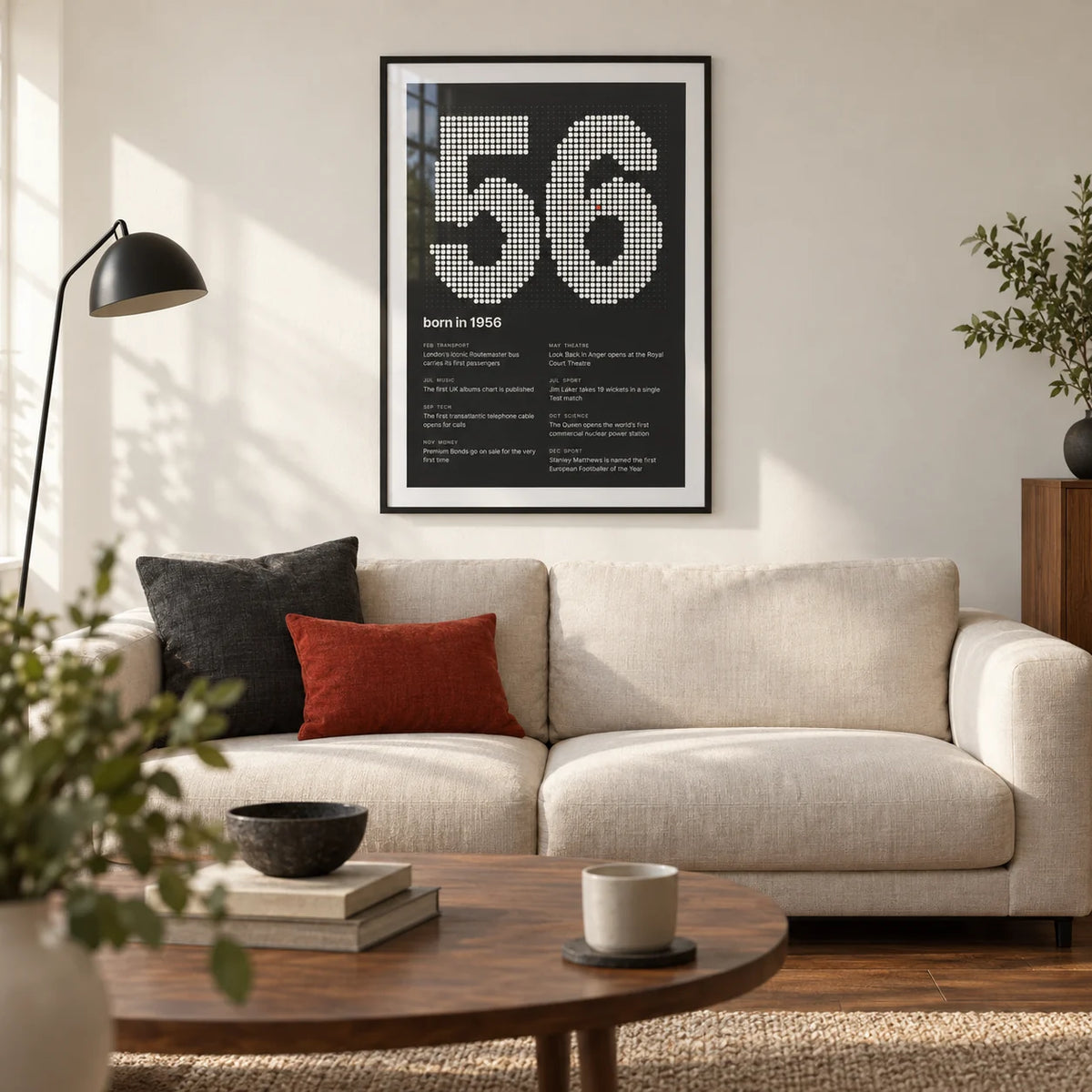 1956 Halftone Print, framed on the wall of a modern living room in a design-conscious older couple's UK home with a warm white wall and walnut floor