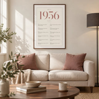 1956 Pink Birthday Print, framed on the wall of a refined modern living room in a UK townhouse with an ivory wall and warm oak flooring